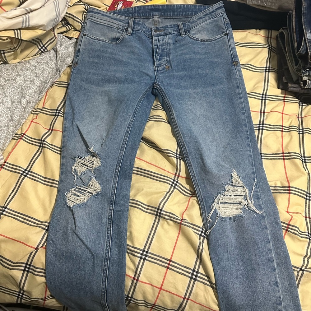 Ksubi ripped blue jeans